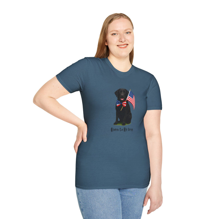 Indigo Blue t-shirt featuring a patriotic Black Lab wearing an American flag bowtie and holding U.S. flags, with the Black Labphrase "Born to Be Free" printed below — perfect for dog lovers and patriotic Americans.