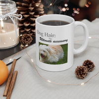 White ceramic mug featuring a photo of dogs lying on grass, with the humorous quote "Dog Hair: The Ultimate Accessory" printed below the image.
