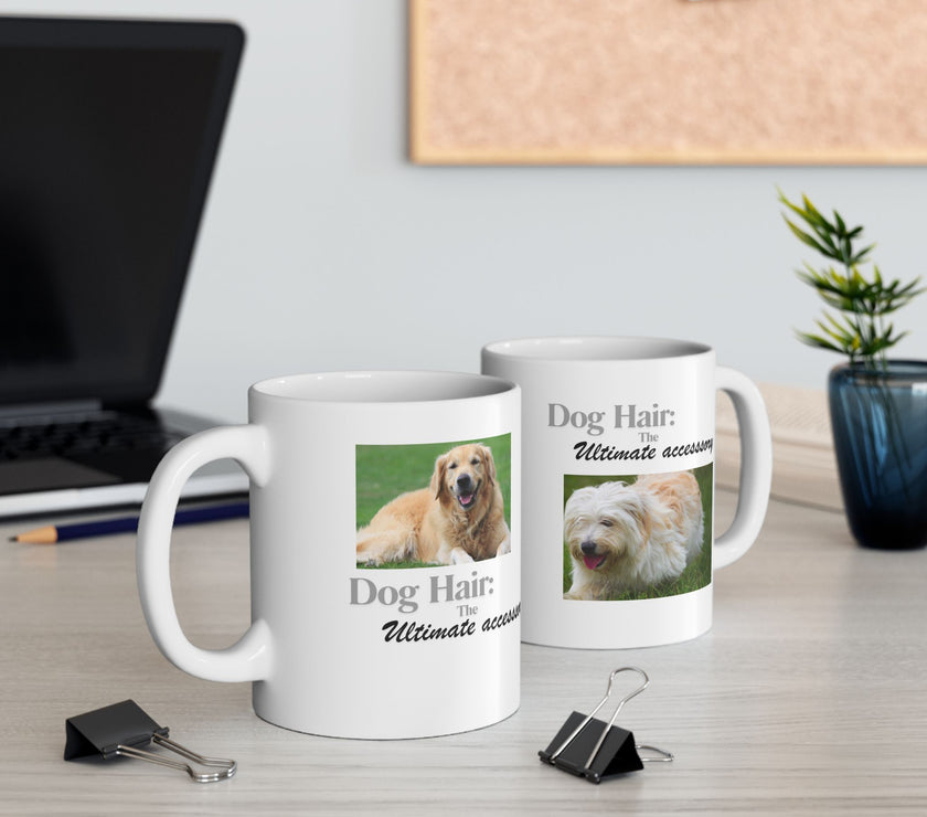 White ceramic mug featuring a photo of dogs lying on grass, with the humorous quote "Dog Hair: The Ultimate Accessory" printed below the image.