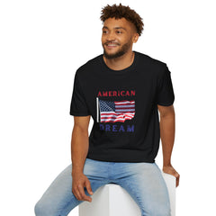 Male wearing T-shirt featuring an American flag graphic with the words 'AMERICAN DREAM' in red and blue text above and below the flag