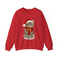 Red sweatshirt featuring a gray kitten wearing a Santa hat and red scarf, holding a small red gift box with a gold bow, surrounded by snowflake designs.
