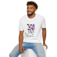 Male wearing T-shirt featuring a cute golden doodle puppy wearing an American flag bow tie and holding a small U.S. flag, with the phrase 'Born to Be Free' printed below the image.