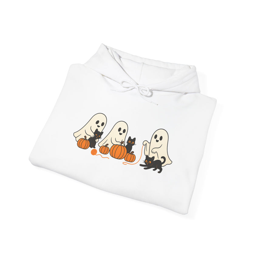 Folded white garment with Halloween-themed design featuring ghosts and cats on pumpkins.