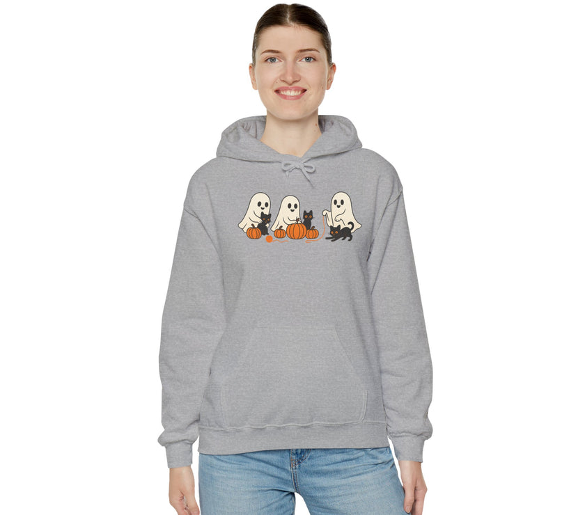 Person wearing a gray hoodie with Halloween-themed design on a white background