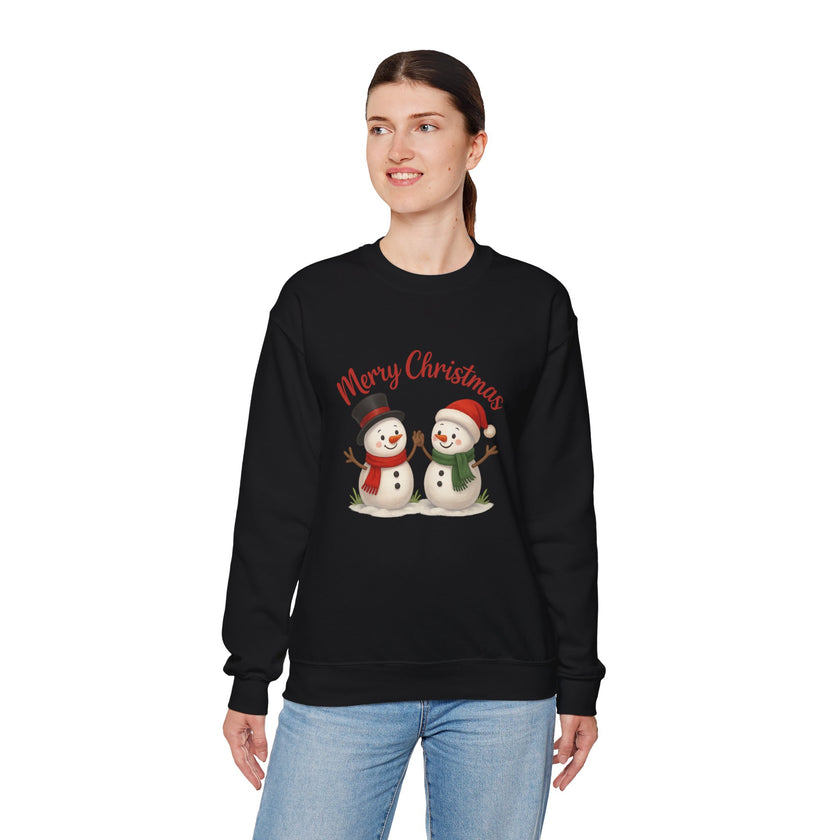 Person wearing a black Christmas-themed sweatshirt with snowmen graphics on a white background