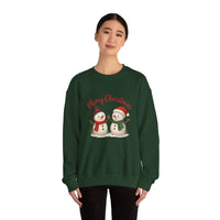 Person wearing a green Christmas-themed sweatshirt with snowmen and 'Merry Christmas' text.