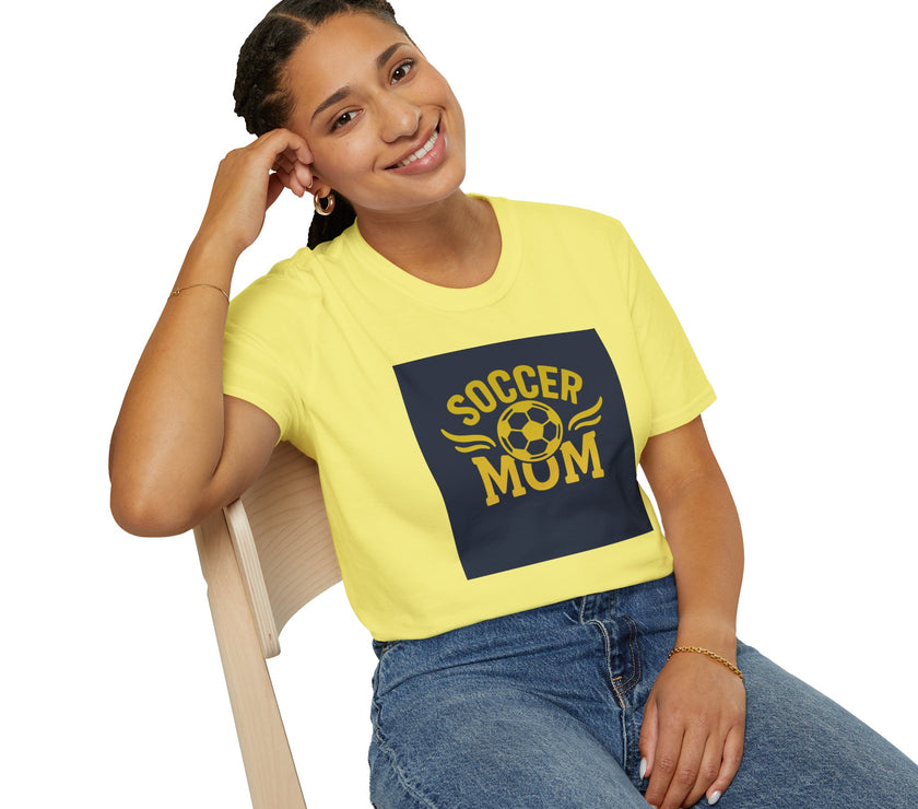Woman wearing a yellow t-shirt with 'Soccer Mum' text, sitting on a chair.