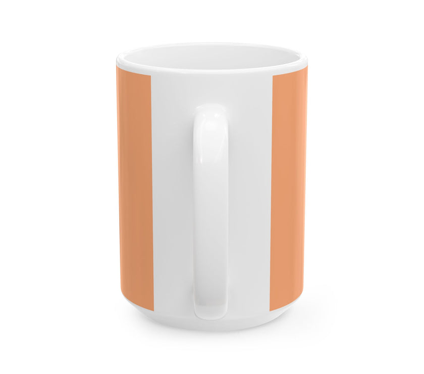 White mug with orange handles on a white background