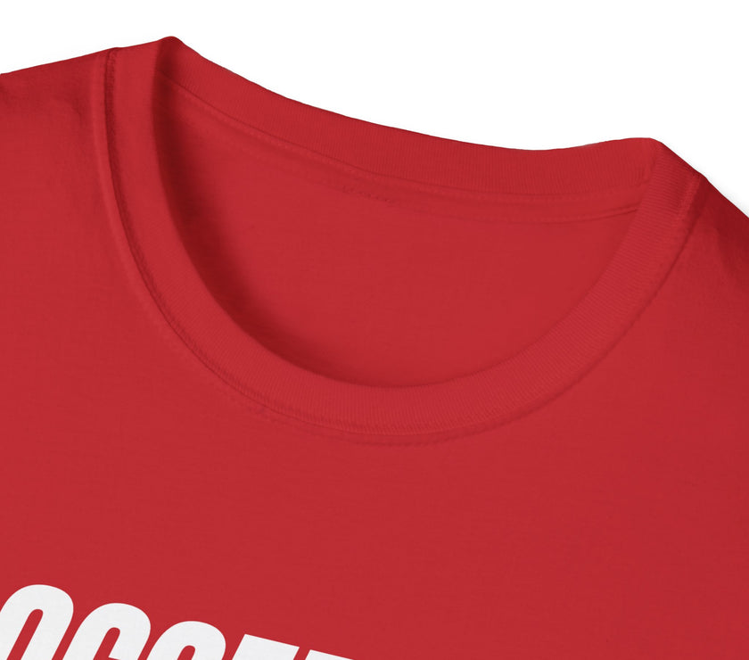 Close-up of a red shirt with white text on a white background