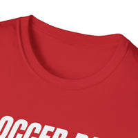 Close-up of a red shirt with white text on a white background