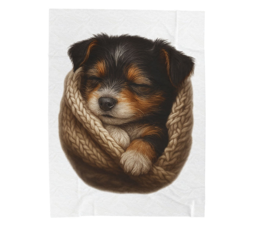 Blanket with Puppy wrapped in a knitted blanket on a white 