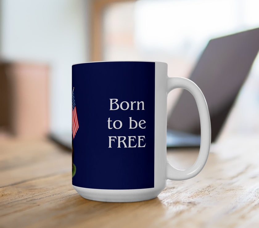 A ceramic mug featuring a Rottweiler sitting on grass, wearing a red, white, and blue bow tie, and holding an American flag against a dark blue background. with the message "Born to be Free"