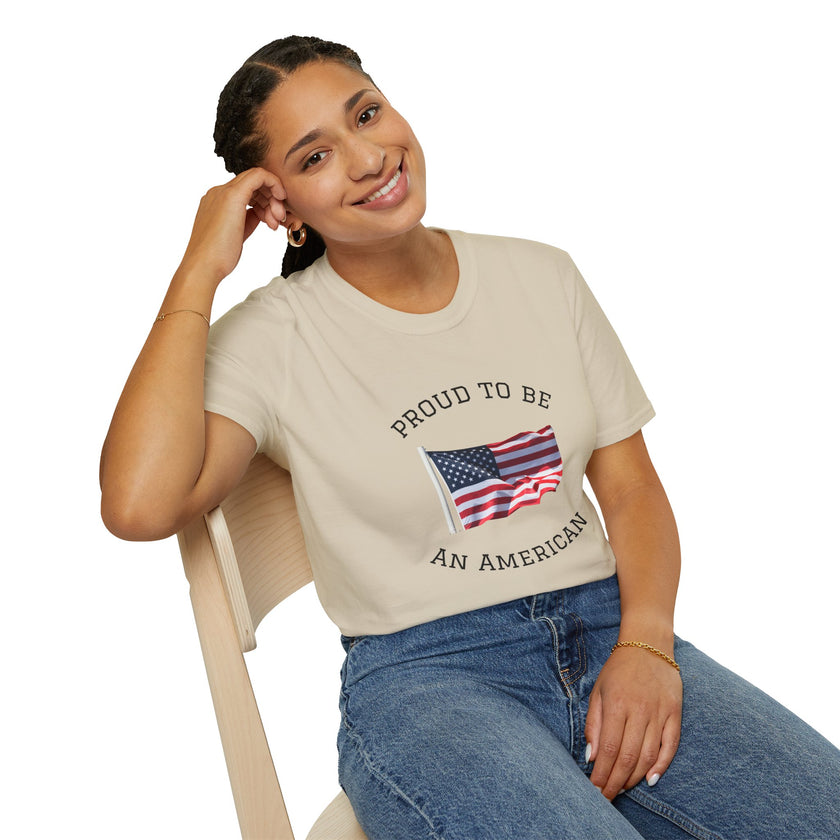 Smiling woman  wearing a white t-shirt with an American flag graphic and the words 'Proud to Be an American' printed around the flag