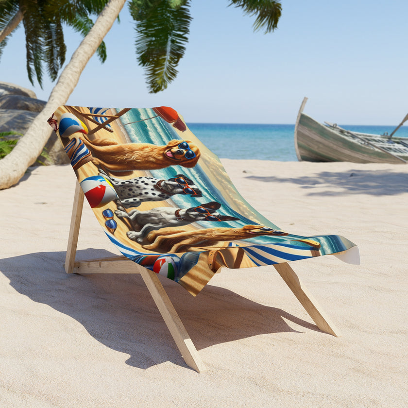 Colorful beach towel featuring four stylish dogs wearing sunglasses, sitting on a sandy beach with beach chairs, beach balls, and ocean waves in the background under a bright sky.