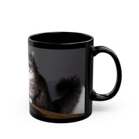 Black ceramic mug featuring a cartoon-style image of a cat sitting at a computer with the funny quote “I work hard so my cat can have a better life.”