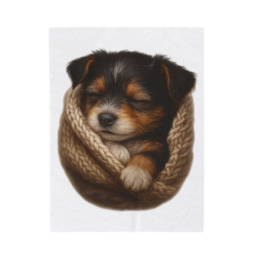 Blanket with Puppy wrapped in a knitted blanket on a white 