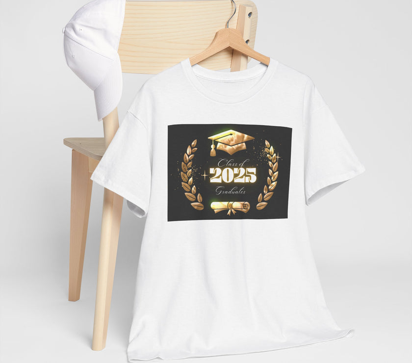 Light gray or white unisex T-shirt featuring a bold "Class of 2025 Graduates" design in gold, with a graduation cap, laurel wreath, and diploma printed on the front.  T-shirt is on hanger