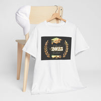 Light gray or white unisex T-shirt featuring a bold "Class of 2025 Graduates" design in gold, with a graduation cap, laurel wreath, and diploma printed on the front.  T-shirt is on hanger