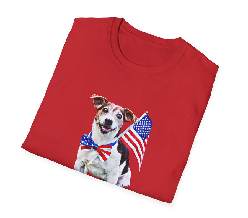 Folded T-shirt featuring a cute  puppy wearing an American flag bow tie and holding a small U.S. flag, with the phrase 'Born to Be Free' printed below the image.