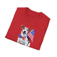 Folded T-shirt featuring a cute  puppy wearing an American flag bow tie and holding a small U.S. flag, with the phrase 'Born to Be Free' printed below the image.