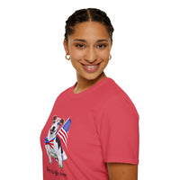 Female wearing T-shirt featuring a cute  puppy wearing an American flag bow tie and holding a small U.S. flag, with the phrase 'Born to Be Free' printed below the image.