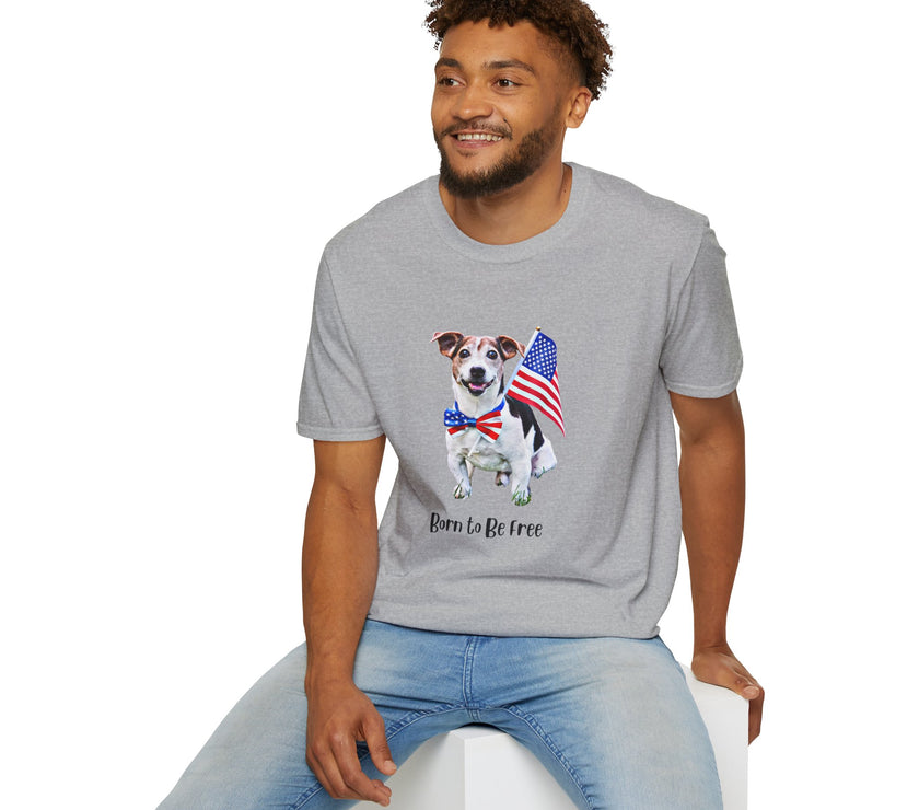 Male wearing T-shirt featuring a cute golden doodle puppy wearing an American flag bow tie and holding a small U.S. flag, with the phrase 'Born to Be Free' printed below the image.