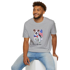 Male wearing T-shirt featuring a cute golden doodle puppy wearing an American flag bow tie and holding a small U.S. flag, with the phrase 'Born to Be Free' printed below the image.