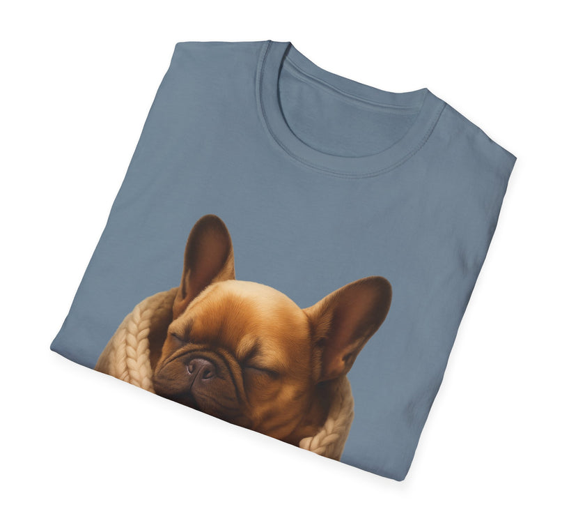 Folded blue t-shirt with a brown dog design on a white background