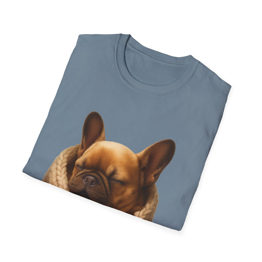 Folded blue t-shirt with a brown dog design on a white background