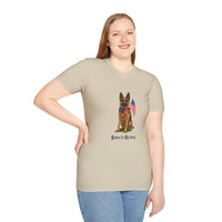 Beige t-shirt featuring a patriotic German Shepherd wearing an American flag bowtie and holding U.S. flags, with the phrase "Born to Be Free" printed below — perfect for dog lovers and patriotic Americans.