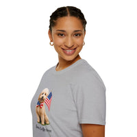 Female wearing T-shirt featuring a cute golden doodle puppy wearing an American flag bow tie and holding a small U.S. flag, with the phrase 'Born to Be Free' printed below the image.