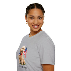Female wearing T-shirt featuring a cute golden doodle puppy wearing an American flag bow tie and holding a small U.S. flag, with the phrase 'Born to Be Free' printed below the image.