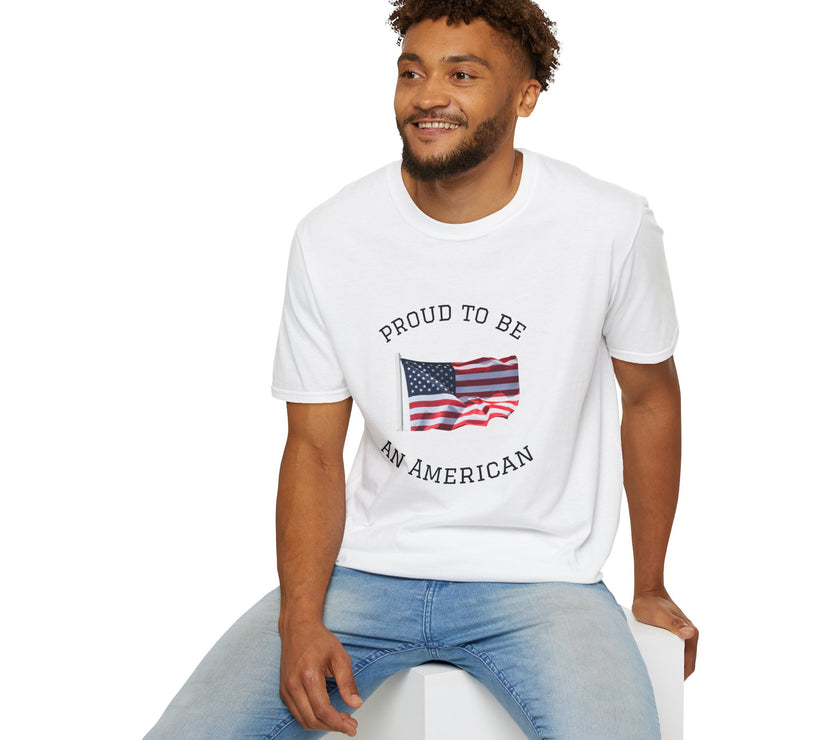 Young man  wearing a white t-shirt with an American flag graphic and the words 'Proud to Be an American' printed around the flag