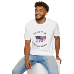 Young man  wearing a white t-shirt with an American flag graphic and the words 'Proud to Be an American' printed around the flag