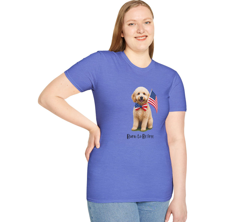 Female wearing T-shirt featuring a cute golden doodle puppy wearing an American flag bow tie and holding a small U.S. flag, with the phrase 'Born to Be Free' printed below the image.