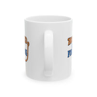 A white ceramic coffee mug displayed against a plain background, featuring the phrase "Hooked on Fishing" in bold orange and blue text with a graphic of a fishing hook integrated into the design.  View from handle