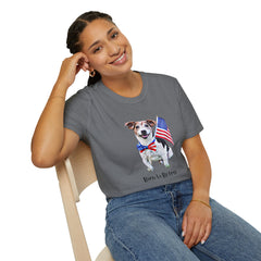 Female wearing T-shirt featuring a cute  puppy wearing an American flag bow tie and holding a small U.S. flag, with the phrase 'Born to Be Free' printed below the image.