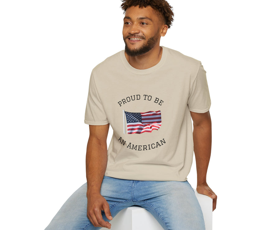 Young man  wearing a white t-shirt with an American flag graphic and the words 'Proud to Be an American' printed around the flag