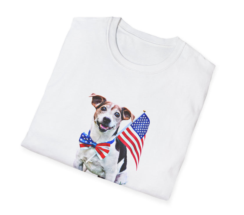 Folded T-shirt featuring a cute  puppy wearing an American flag bow tie and holding a small U.S. flag, with the phrase 'Born to Be Free' printed below the image.