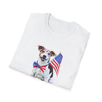 Folded T-shirt featuring a cute  puppy wearing an American flag bow tie and holding a small U.S. flag, with the phrase 'Born to Be Free' printed below the image.