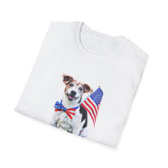 Folded T-shirt featuring a cute  puppy wearing an American flag bow tie and holding a small U.S. flag, with the phrase 'Born to Be Free' printed below the image.