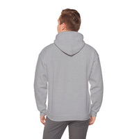 Person wearing a gray hoodie on a white background