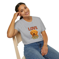 Person wearing a gray t-shirt with a dog graphic and text, sitting on a chair.