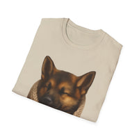Folded beige t-shirt with a dog graphic on a white background