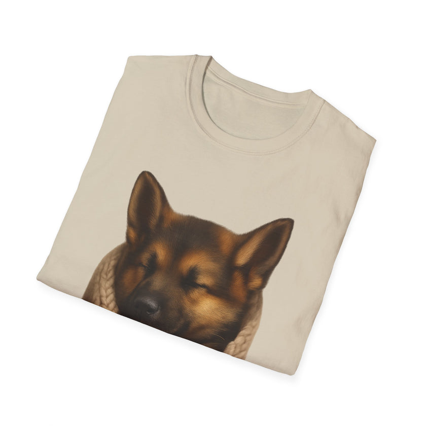 Folded beige t-shirt with a dog graphic on a white background