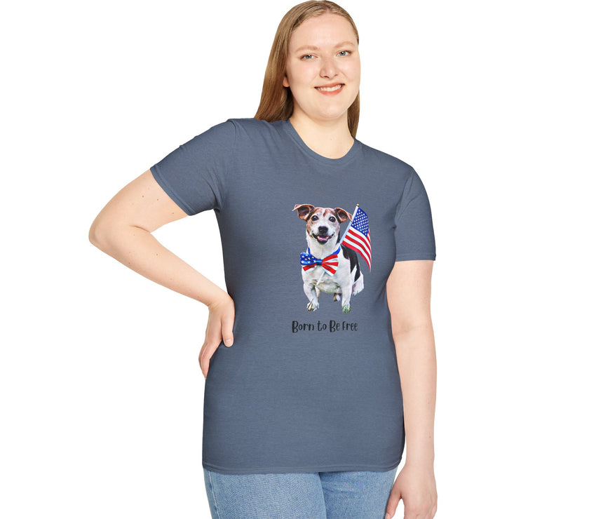 Female wearing T-shirt featuring a cute  puppy wearing an American flag bow tie and holding a small U.S. flag, with the phrase 'Born to Be Free' printed below the image.