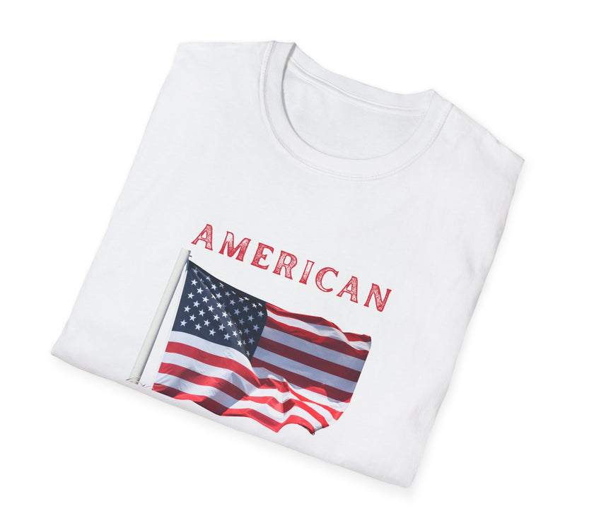 FoldedT-shirt featuring an American flag graphic with the words 'AMERICAN DREAM' in red and blue text above and below the flag