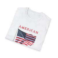 FoldedT-shirt featuring an American flag graphic with the words 'AMERICAN DREAM' in red and blue text above and below the flag