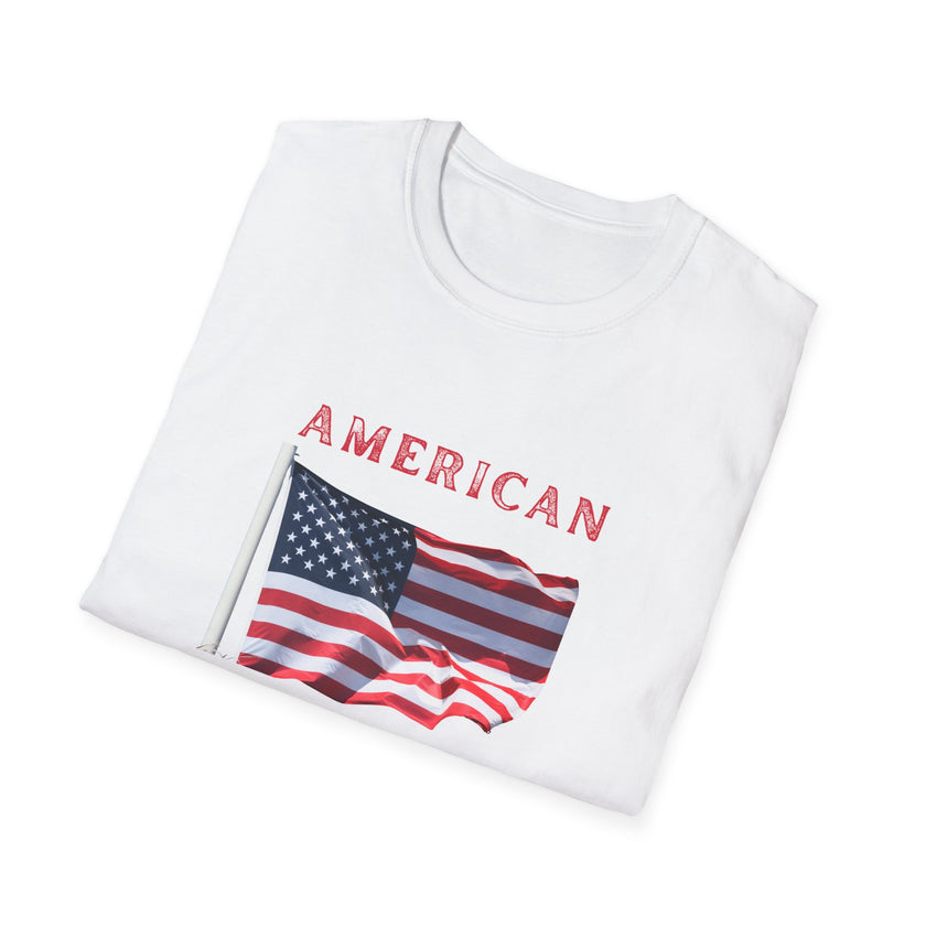 FoldedT-shirt featuring an American flag graphic with the words 'AMERICAN DREAM' in red and blue text above and below the flag