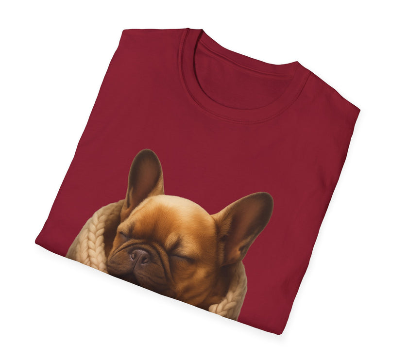 Folded maroon t-shirt with a dog graphic on a white background